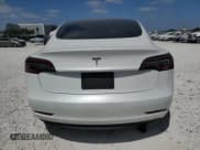 ✅ 2023 Tesla Model 3 • VIN: 5YJ3E1EA3PF495778 • Лот: 54877465. Опубликован ранее на Copart с пробегом 31 525 миль. Бесплатный доступ к архиву аукционных продаж из США и подробный отчёт об истории автомобиля на DreamBid. Изображение 6.