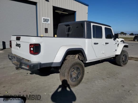 ✅ 2021 Jeep Gladiator Willys • VIN: 1C6HJTAG6ML565992 • Лот: 91303275. Опубликован ранее на Copart с пробегом 27 904 миль. Бесплатный доступ к архиву аукционных продаж из США и подробный отчёт об истории автомобиля на DreamBid. Изображение 3.