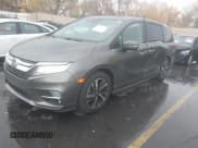 ✅ 2018 Honda Odyssey Elite • VIN: 5FNRL6H90JB059167 • Lot: 43741041. Listed on IAAI with 100,118 mi. Free auction sales archive from the USA and detailed vehicle history report at DreamBid. Image 2.