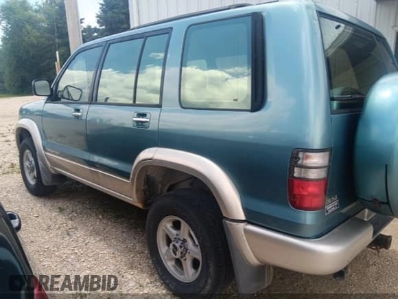 ✅ 2002 Isuzu Trooper S • VIN: JACDJ58X727J09867 • Lot: 42590444. Listed on IAAI with 152,172 mi. Free auction sales archive from the USA and detailed vehicle history report at DreamBid. Image 3.