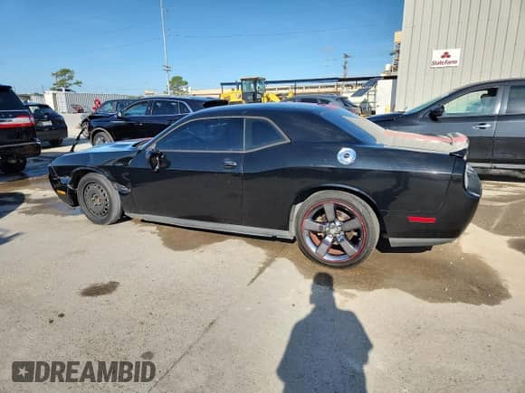 2014 Dodge Challenger SXT z VIN 2C3CDYAG5EH100467, wystawiony jako Copart lot #85343015 z przebiegiem 169 078 mil mil oraz Szkoda całkowita • Salvage title. Historia ofert i sprzedaży dostępna na DreamBid. Obrazek 2.