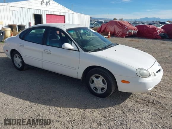 ✅ 1996 Ford Taurus GL • VIN: 1FALP52U3TG166939 • Lot: 43633645. Wystawiony na IAAI z przebiegiem 159 788 mil. Bezpłatny archiwum sprzedaży aukcyjnych z USA i szczegółowy raport historii pojazdu na DreamBid. Zdjęcie 1.