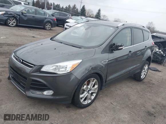 ✅ 2015 Ford Escape Titanium • VIN: 1FMCU0J98FUC22121 • Lot: 41145013. Listed on IAAI with 140,689 mi. Free auction sales archive from the USA and detailed vehicle history report at DreamBid. Image 17.
