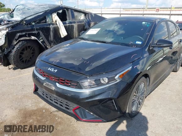 ✅ 2023 Kia Forte GT-Line • VIN: 3KPF54AD7PE648280 • Лот: 43267860. Опубликован ранее на IAAI с пробегом 18 818 миль. Бесплатный доступ к архиву аукционных продаж из США и подробный отчёт об истории автомобиля на DreamBid. Изображение 2.