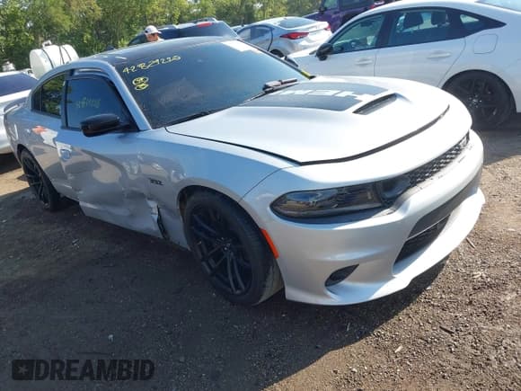 ✅ 2023 Dodge Charger Scat Pack Widebody • VIN: 2C3CDXGJ9PH699759 • Lot: 42824220. Listed on IAAI with 3,338 mi. Free auction sales archive from the USA and detailed vehicle history report at DreamBid. Image 1.