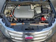 ✅ 2010 Ford Fusion Hybrid • VIN: 3FADP0L39AR166995 • Lot: 94321235. Wystawiony na Copart z przebiegiem 93 333 mil. Bezpłatny archiwum sprzedaży aukcyjnych z USA i szczegółowy raport historii pojazdu na DreamBid. Zdjęcie 11.