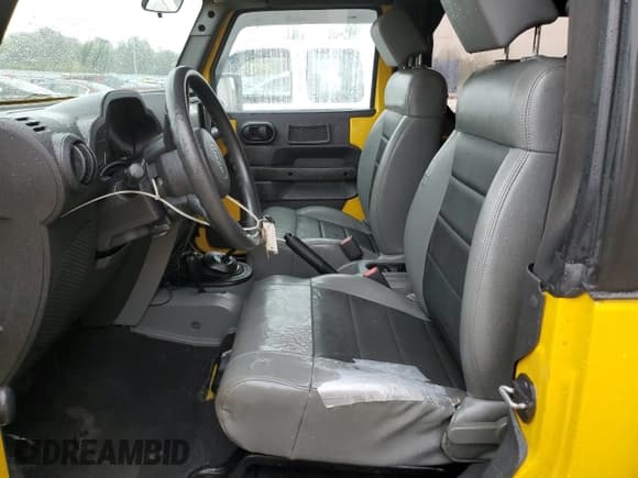 ✅ 2009 Jeep Wrangler X • VIN: 1J4FA24169L775219 • Lot: 71110304. Listed on Copart with 132,886 mi. Free auction sales archive from the USA and detailed vehicle history report at DreamBid. Image 7.