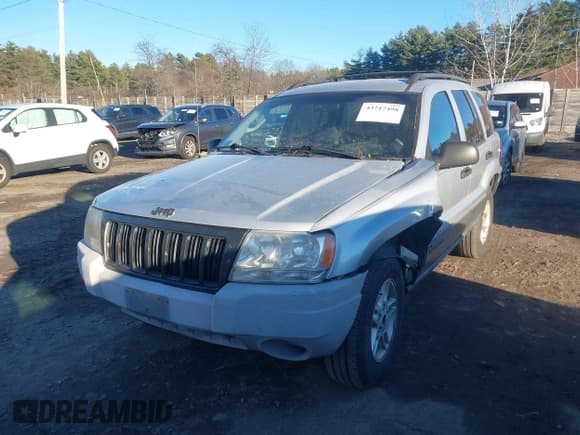 ✅ 2004 Jeep Grand Cherokee Laredo • VIN: 1J4GW48S84C239613 • Lot: 43717498. Listed on IAAI with 137,653 mi. Free auction sales archive from the USA and detailed vehicle history report at DreamBid. Image 2.