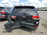 ✅ 2018 Jeep Grand Cherokee Laredo E • VIN: 1C4RJFAG3JC507526 • Lot: 85646375. Listed on Copart with 104,010 mi. Free auction sales archive from the USA and detailed vehicle history report at DreamBid. Image 6.