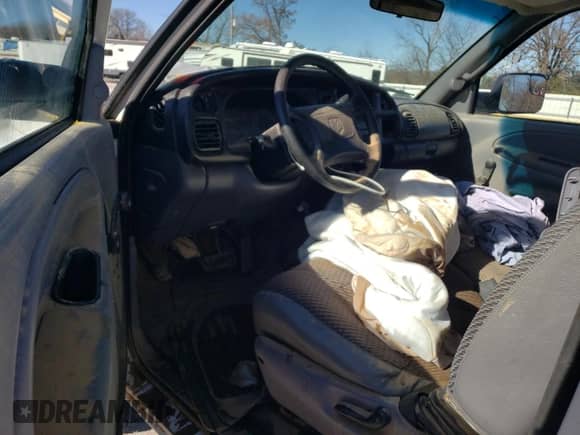 1999 Dodge 1500 с VIN 3B7HF13Z7XG136326, выставлен на аукционе Copart как лот 80277284 с пробегом Не указан миль и Списание • Salvage title. История ставок и продаж доступна на DreamBid. Изображение 8.