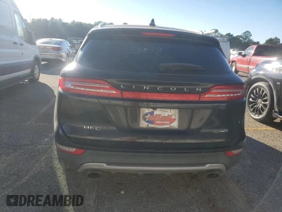 ✅ 2015 Lincoln MKC • VIN: 5LMTJ2AH5FUJ42896 • Lot: 82647845. Listed on Copart with 102,713 mi. Free auction sales archive from the USA and detailed vehicle history report at DreamBid. Image 6.