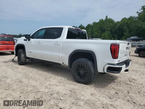 ✅ 2023 GMC Sierra 1500 AT4X • VIN: 3GTUUFEL5PG154494 • Лот: 65573915. Опубликован ранее на Copart с пробегом 25 191 миль. Бесплатный доступ к архиву аукционных продаж из США и подробный отчёт об истории автомобиля на DreamBid. Изображение 2.