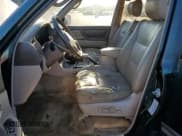 ✅ 2000 Toyota Land Cruiser • VIN: JT3HT05J7Y0118395 • Lot: 89437145. Wystawiony na Copart z przebiegiem 469 873 mil. Bezpłatny archiwum sprzedaży aukcyjnych z USA i szczegółowy raport historii pojazdu na DreamBid. Zdjęcie 7.