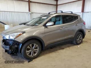 ✅ 2016 Hyundai Santa Fe • VIN: 5XYZUDLB3GG325682 • Лот: 50982984. Опубликован ранее на Copart с пробегом 67 011 миль. Бесплатный доступ к архиву аукционных продаж из США и подробный отчёт об истории автомобиля на DreamBid. Изображение 1.