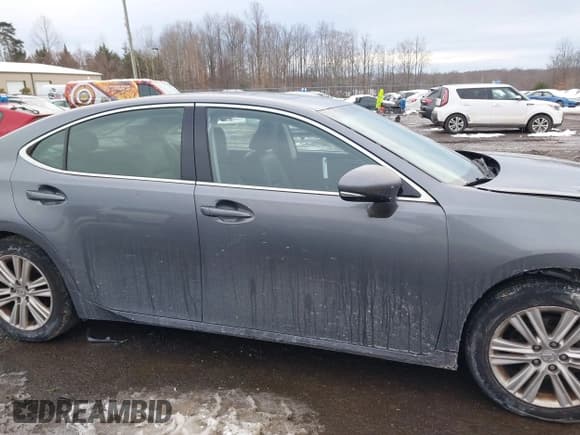 ✅ 2014 Lexus ES 330 • VIN: JTHBK1GG0E2113100 • Lot: 41309816. Listed on IAAI with 233,535 mi. Free auction sales archive from the USA and detailed vehicle history report at DreamBid. Image 14.