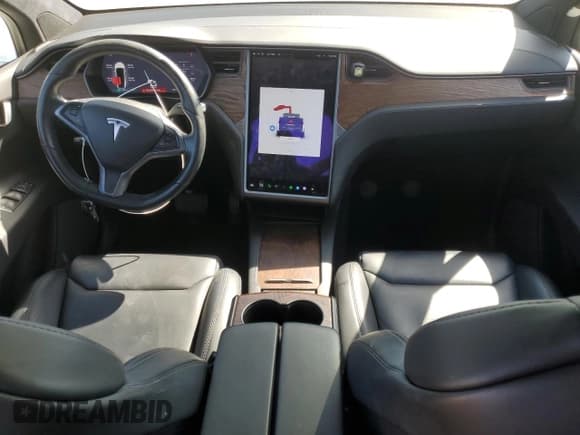 ✅ 2019 Tesla Model X 75D • VIN: 5YJXCAE24KF151420 • Lot: 82215815. Listed on Copart with 99,594 mi. Free auction sales archive from the USA and detailed vehicle history report at DreamBid. Image 8.
