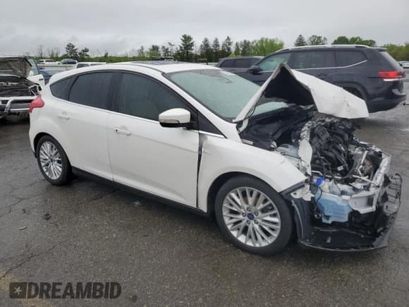 ✅ 2017 Ford Focus Titanium • VIN: 1FADP3N23HL244301 • Lot: 56625555. Listed on Copart with 96,304 mi. Free auction sales archive from the USA and detailed vehicle history report at DreamBid. Image 4.