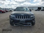 ✅ 2014 Jeep Grand Cherokee Overland • VIN: 1C4RJFCG0EC255463 • Lot: 67548855. Listed on Copart with 202,647 mi. Free auction sales archive from the USA and detailed vehicle history report at DreamBid. Image 5.