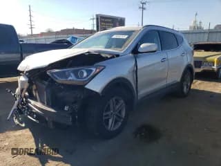 ✅ 2018 Hyundai Santa Fe 2.4L • VIN: 5XYZUDLB9JG505921 • Лот: 76648243. Опубликован ранее на Copart с пробегом 65 623 миль. Бесплатный доступ к архиву аукционных продаж из США и подробный отчёт об истории автомобиля на DreamBid. Изображение 1.
