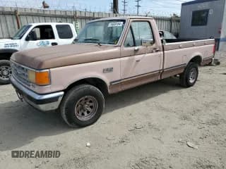 ✅ 1987 Ford F-150 • VIN: 1FTEF14Y2HPA69253 • Лот: 74633154. Опубликован ранее на Copart с пробегом 93 684 миль. Бесплатный доступ к архиву аукционных продаж из США и подробный отчёт об истории автомобиля на DreamBid. Изображение 1.