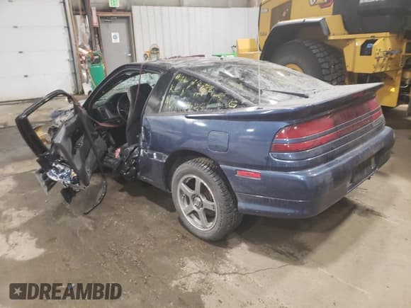 ✅ 1991 Mitsubishi Eclipse • VIN: 4A3CS54U5ME034104 • Lot: 82414954. Wystawiony na Copart z przebiegiem 474 141 mil. Bezpłatny archiwum sprzedaży aukcyjnych z USA i szczegółowy raport historii pojazdu na DreamBid. Zdjęcie 2.