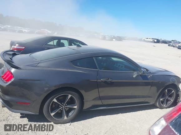 ✅ 2020 Ford Mustang EcoBoost Premium • VIN: 1FA6P8TH1L5170712 • Лот: 43477810. Опубликован ранее на IAAI с пробегом 59 337 миль. Бесплатный доступ к архиву аукционных продаж из США и подробный отчёт об истории автомобиля на DreamBid. Изображение 13.