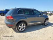 ✅ 2013 Volkswagen Touareg Lux • VIN: WVGEF9BPXDD007888 • Lot: 61243265. Listed on Copart with 90,370 mi. Free auction sales archive from the USA and detailed vehicle history report at DreamBid. Image 3.