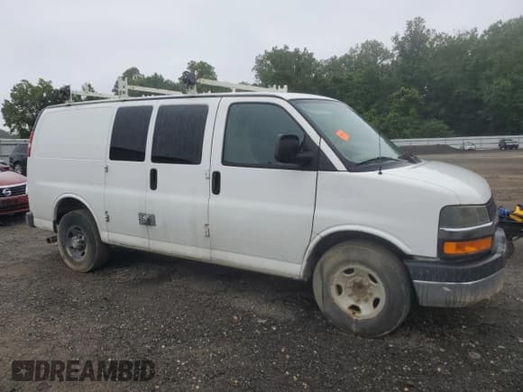 ✅ 2014 Chevrolet Express Cargo • VIN: 1GCWGFCG2E1183226 • Lot: 67111245. Listed on Copart with 181,401 mi. Free auction sales archive from the USA and detailed vehicle history report at DreamBid. Image 4.