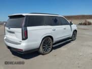 ✅ 2022 Cadillac Escalade Sport • VIN: 1GYS4FKL2NR124467 • Lot: 43011587. Listed on IAAI with 77,844 mi. Free auction sales archive from the USA and detailed vehicle history report at DreamBid. Image 4.