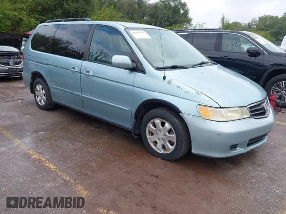 ✅ 2004 Honda Odyssey EX-L • VIN: 5FNRL18014B065259 • Lot: 43287370. Listed on IAAI with 241,846 mi. Free auction sales archive from the USA and detailed vehicle history report at DreamBid. Image 1.