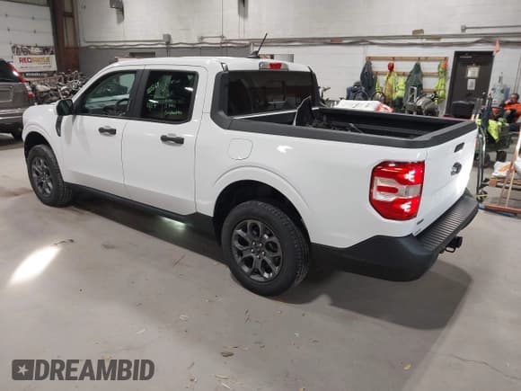 ✅ 2023 Ford Maverick XLT • VIN: 3FTTW8E30PRA42885 • Лот: 43777220. Опубликован ранее на IAAI с пробегом 52 940 миль. Бесплатный доступ к архиву аукционных продаж из США и подробный отчёт об истории автомобиля на DreamBid. Изображение 3.