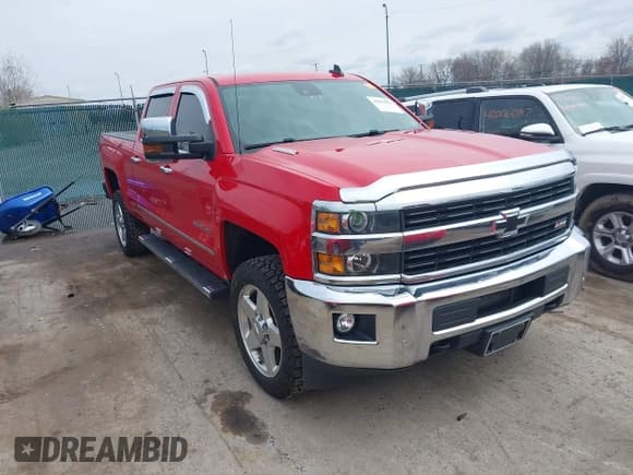 ✅ 2015 Chevrolet Silverado 2500HD LTZ • VIN: 1GC1KWE83FF616085 • Lot: 41987956. Listed on IAAI with 72,950 mi. Free auction sales archive from the USA and detailed vehicle history report at DreamBid. Image 1.