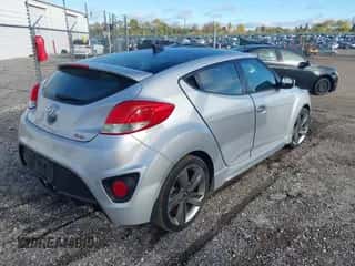 2014 Hyundai Veloster Turbo with VIN KMHTC6AE9EU189356, listed as a IAAI auction lot 43529684 with 96,297 mi miles and . Bid and sale history available at DreamBid. Image 4.