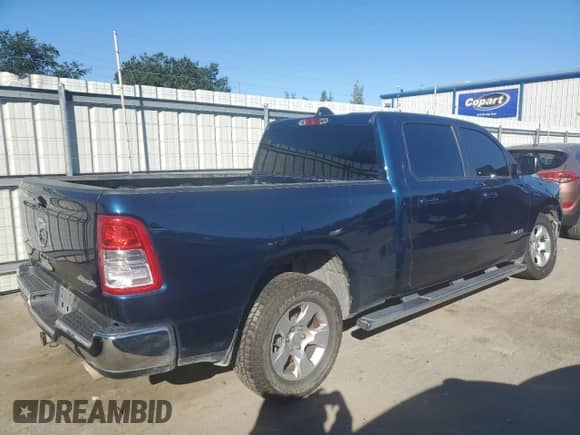 2021 Ram 1500 Big Horn with VIN 1C6SRFMT5MN819527, listed as a Copart auction lot 84005515 with 66,286 mi miles and Salvage title. Bid and sale history available at DreamBid. Image 3.