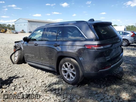 2022 Jeep Grand Cherokee Limited with VIN 1C4RJHBG0N8586432, listed as a Copart auction lot 70316565 with 34,728 mi miles and Salvage title. Bid and sale history available at DreamBid. Image 2.