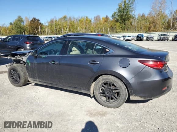 ✅ 2016 Mazda 6 i Sport • VIN: JM1GJ1U56G1405629 • Лот: 83975495. Опубликован ранее на Copart с пробегом 114 153 миль. Бесплатный доступ к архиву аукционных продаж из США и подробный отчёт об истории автомобиля на DreamBid. Изображение 2.