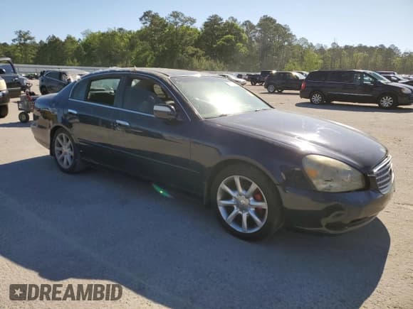 ✅ 2003 Infiniti Q45 • VIN: JNKBF01A53M101447 • Lot: 53293135. Listed on Copart with 195,230 mi. Free auction sales archive from the USA and detailed vehicle history report at DreamBid. Image 4.