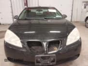 ✅ 2009 Pontiac G6 1SA • VIN: 1G2ZG57B994171248 • Lot: 42335463. Listed on IAAI with 169,611 mi. Free auction sales archive from the USA and detailed vehicle history report at DreamBid. Image 6.