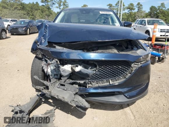 ✅ 2020 Mazda CX-5 Grand Touring • VIN: JM3KFADM2L0761005 • Lot: 87092095. Listed on Copart with Not provided. Free auction sales archive from the USA and detailed vehicle history report at DreamBid. Image 5.