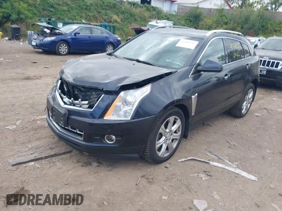 ✅ 2015 Cadillac SRX Performance Collection • VIN: 3GYFNFE38FS546171 • Lot: 43368585. Listed on IAAI with 127,058 mi. Free auction sales archive from the USA and detailed vehicle history report at DreamBid. Image 17.