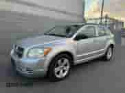 2010 Dodge Caliber SXT with VIN 1B3CB4HA1AD579409, listed as a Copart auction lot 84451614 with 100,311 mi miles and Clean title. Bid and sale history available at DreamBid. Image 2.