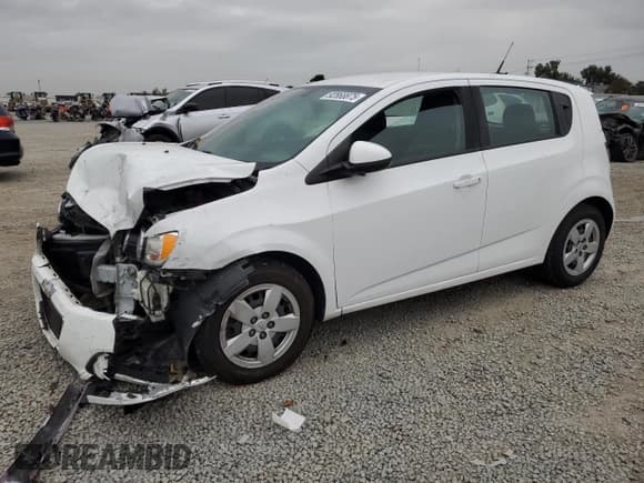 ✅ 2014 Chevrolet Sonic LS • VIN: 1G1JA6SGXE4197654 • Lot: 92868875. Listed on Copart with 115,903 mi. Free auction sales archive from the USA and detailed vehicle history report at DreamBid. Image 1.