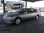 ✅ 2000 Lexus ES 300 • VIN: JT8BF28G9Y5102317 • Lot: 63006745. Wystawiony na Copart z przebiegiem 150 241 mil. Bezpłatny archiwum sprzedaży aukcyjnych z USA i szczegółowy raport historii pojazdu na DreamBid. Zdjęcie 1.