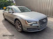 ✅ 2011 Audi A8 • VIN: WAURVAFD7BN018734 • Lot: 85905595. Wystawiony na Copart z przebiegiem 79 694 mil. Bezpłatny archiwum sprzedaży aukcyjnych z USA i szczegółowy raport historii pojazdu na DreamBid. Zdjęcie 1.