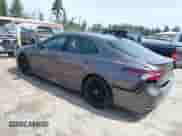 2021 Toyota Camry Hybrid XSE with VIN 4T1K31AK2MU559887, listed as a IAAI auction lot 42487632 with 24,069 mi miles and . Bid and sale history available at DreamBid. Image 3.