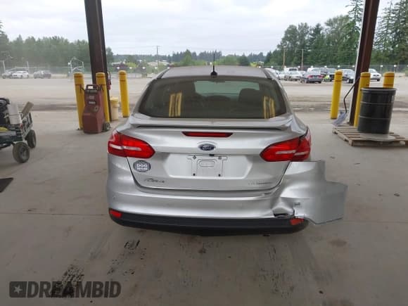 ✅ 2017 Ford Focus Titanium • VIN: 1FADP3J29HL329410 • Lot: 42493519. Listed on IAAI with 22,639 mi. Free auction sales archive from the USA and detailed vehicle history report at DreamBid. Image 16.
