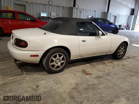 ✅ 1996 Mazda MX-5 Miata • VIN: JM1NA3536T0702870 • Lot: 80779744. Wystawiony na Copart z przebiegiem 90 997 mil. Bezpłatny archiwum sprzedaży aukcyjnych z USA i szczegółowy raport historii pojazdu na DreamBid. Zdjęcie 3.