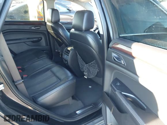 ✅ 2015 Cadillac SRX Luxury Collection • VIN: 3GYFNEE38FS595607 • Lot: 43720579. Listed on IAAI with 103,582 mi. Free auction sales archive from the USA and detailed vehicle history report at DreamBid. Image 8.
