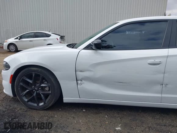 ✅ 2022 Dodge Charger SXT • VIN: 2C3CDXBG8NH110712 • Lot: 43207897. Wystawiony na IAAI z przebiegiem 45 598 mil. Bezpłatny archiwum sprzedaży aukcyjnych z USA i szczegółowy raport historii pojazdu na DreamBid. Zdjęcie 6.