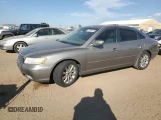 2009 Hyundai Azera Limited with VIN KMHFC46F39A442150, listed as a Copart auction lot 82528255 with 164,486 mi miles and Clean title. Bid and sale history available at DreamBid. Image 1.